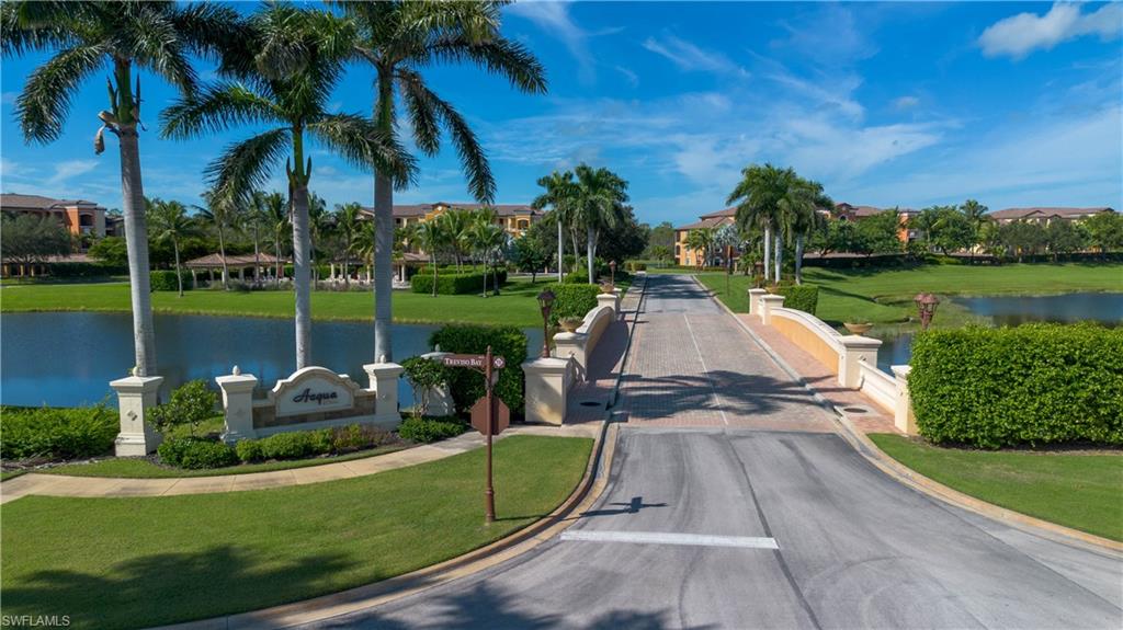 9735 Acqua Court, Unit 641 Naples, FL 34113 - Photo 26 of 34 a view of a swimming pool and lounge chair