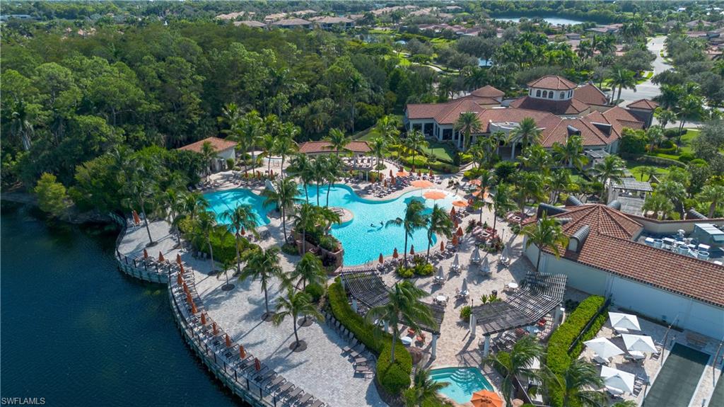 9735 Acqua Court, Unit 641 Naples, FL 34113 - Photo 30 of 34 an aerial view of residential house with outdoor space and swimming pool