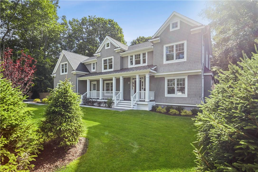 5 Hammond Road Rye, NY 10580 - Photo 1 of 1 a front view of a house with a garden