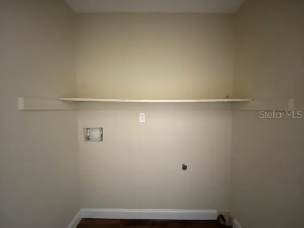 a view of small space with racks on the wall