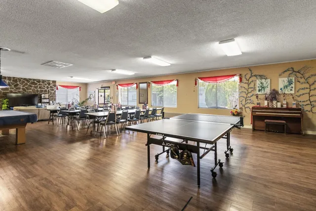 a view of a very nice looking room with kitchen