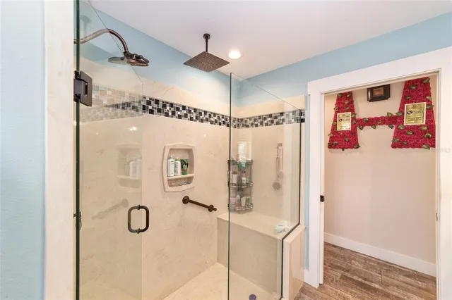 a living room with lots of furniture and a chandelier