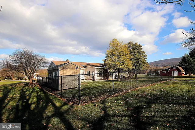 a view of a street with of houses