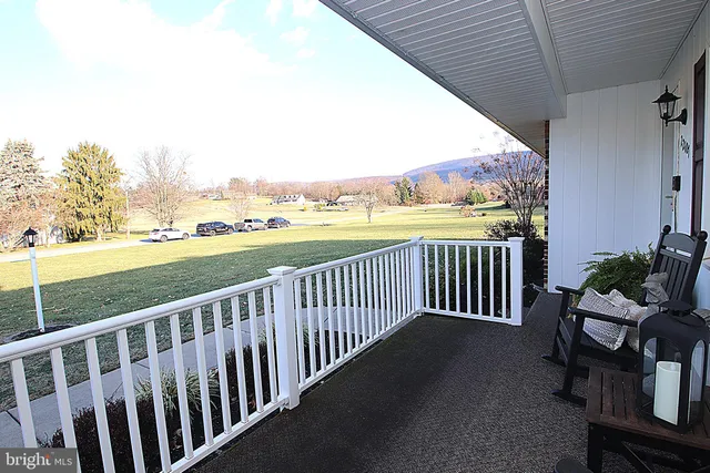 a view of a two chair in the balcony