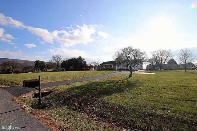 a view of a lake with a yard