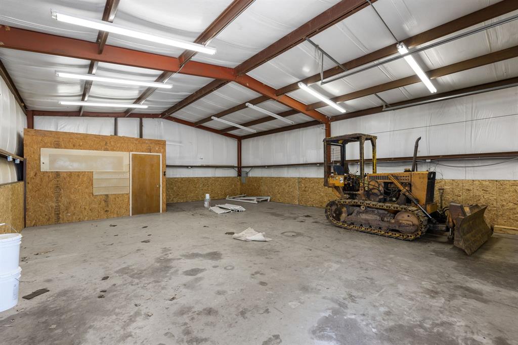 321 Vz County Road 2602 Wills Point, TX 75169 - Photo 37 of 39 Garage with metal wall