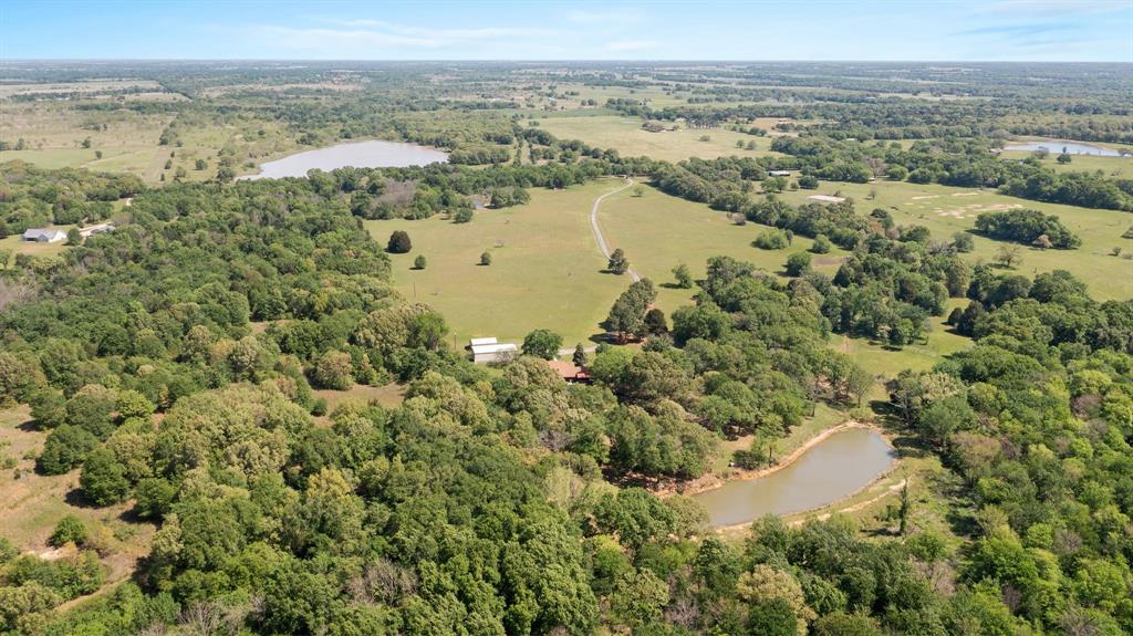 321 Vz County Road 2602 Wills Point, TX 75169 - Photo 38 of 39 Aerial view with a water view and a wooded view