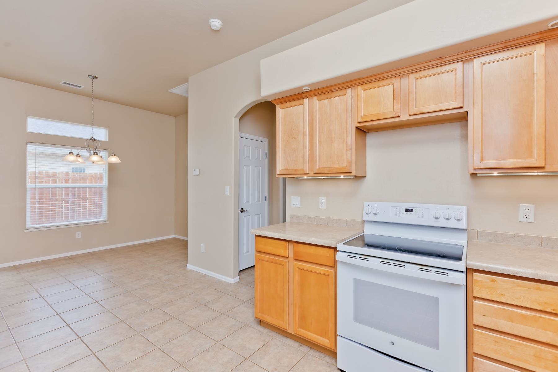 572 Amethyst Drive Fruita, CO 81521 - Photo 8 of 42 a kitchen with a stove a sink and a window