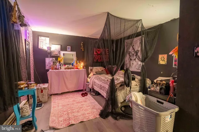 a bathroom with a double vanity sink mirror and shower