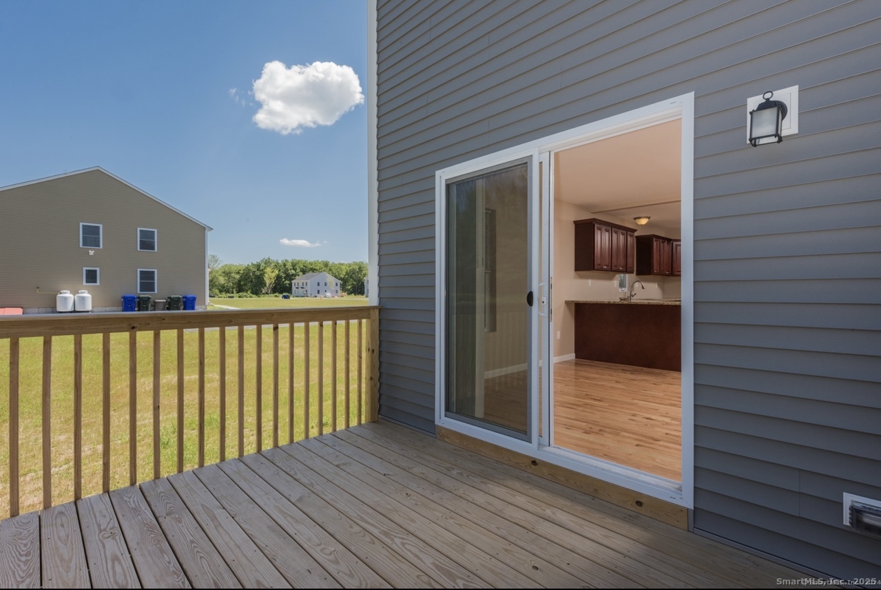 13 Nature Avenue, Unit A Colchester, CT 06415 - Photo 12 of 34 a view of balcony with a potted plant