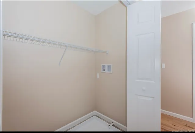 a view of small space with racks on the wall