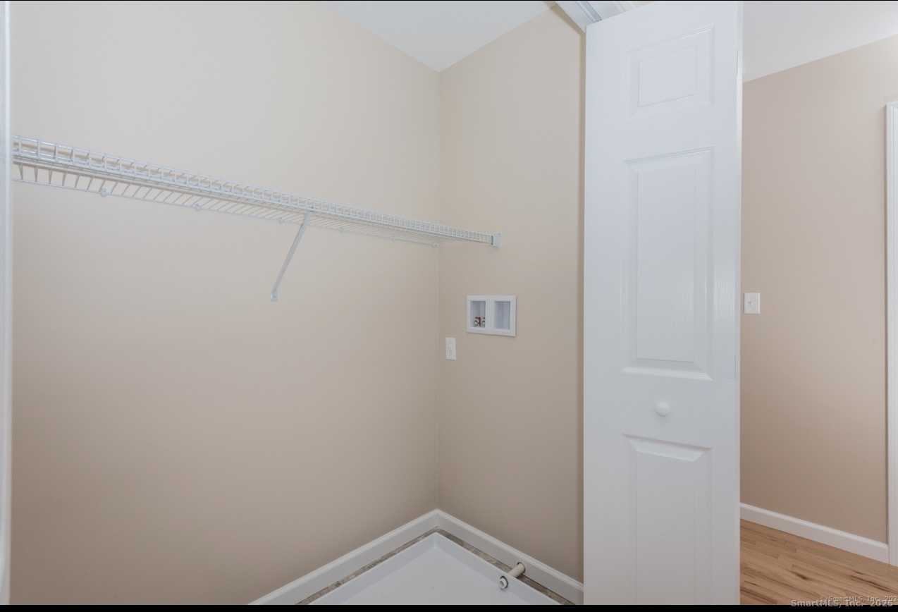 13 Nature Avenue, Unit A Colchester, CT 06415 - Photo 22 of 34 a view of small space with racks on the wall