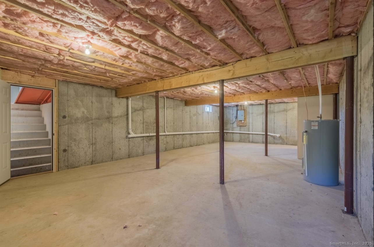 13 Nature Avenue, Unit A Colchester, CT 06415 - Photo 31 of 34 a view of an empty room with a sliding door
