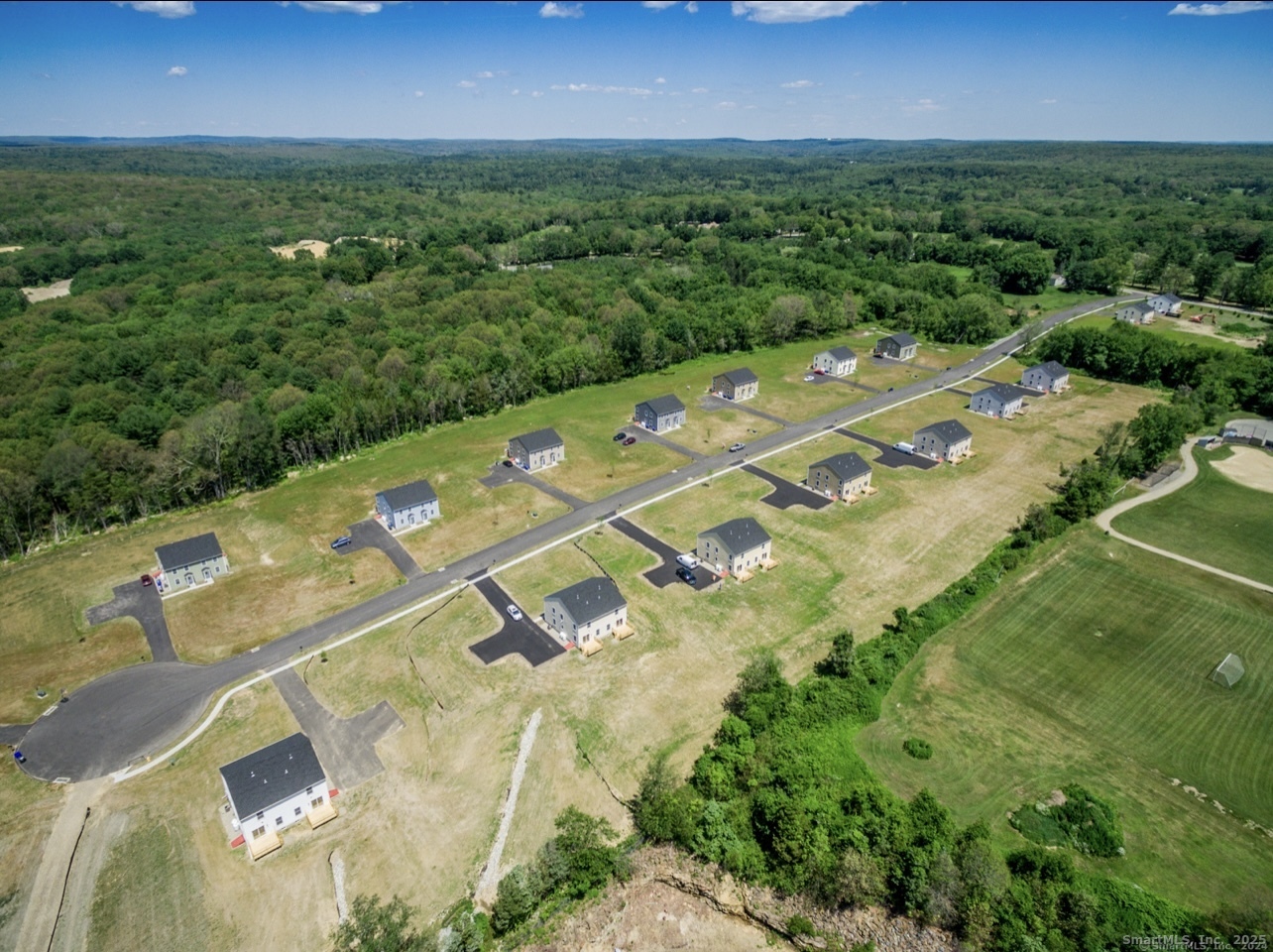 13 Nature Avenue, Unit A Colchester, CT 06415 - Photo 33 of 34 an aerial view of residential houses with outdoor space