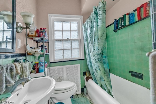 3654 Avalon Road, Unit 2 Cleveland, OH 44120 - Photo 29 of 36 Full bathroom with toilet, sink, tile walls, tile flooring, and shower / bathtub combination with curtain