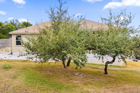 a view of a house with a roof deck