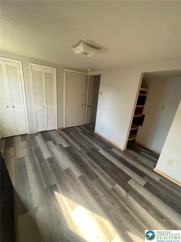 140 South Front Street, Unit REAR Coplay, PA 18037 - Photo 15 of 19 a view of an empty room and stairs