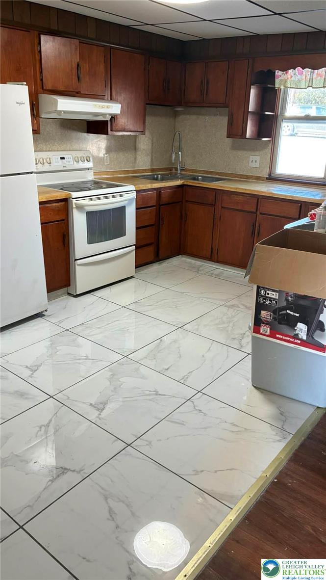 140 South Front Street, Unit REAR Coplay, PA 18037 - Photo 3 of 19 a kitchen with stainless steel appliances a sink stove and cabinets