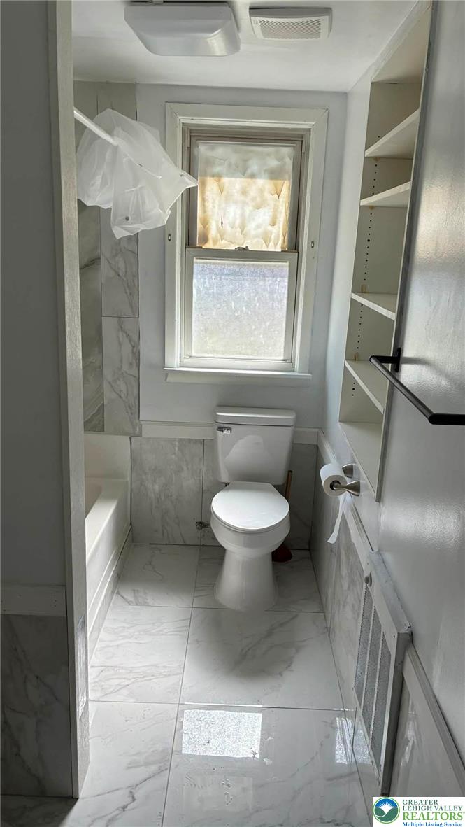 140 South Front Street, Unit REAR Coplay, PA 18037 - Photo 7 of 19 a bathroom with a toilet sink and a shower