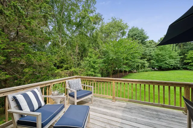 a view of a two chairs in the deck