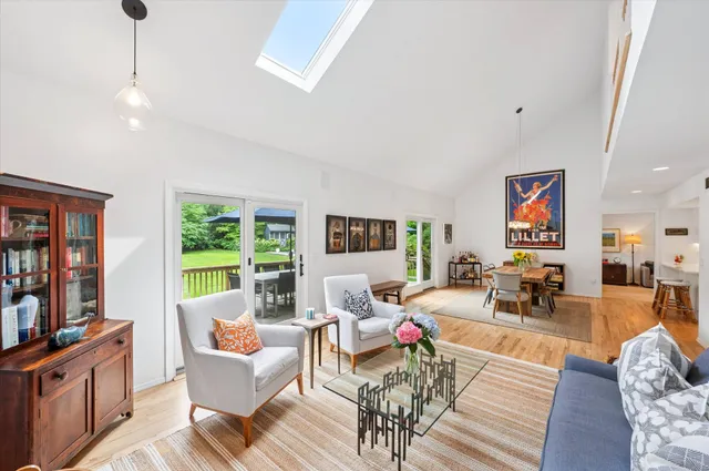 a living room with furniture or couch and a flat screen tv