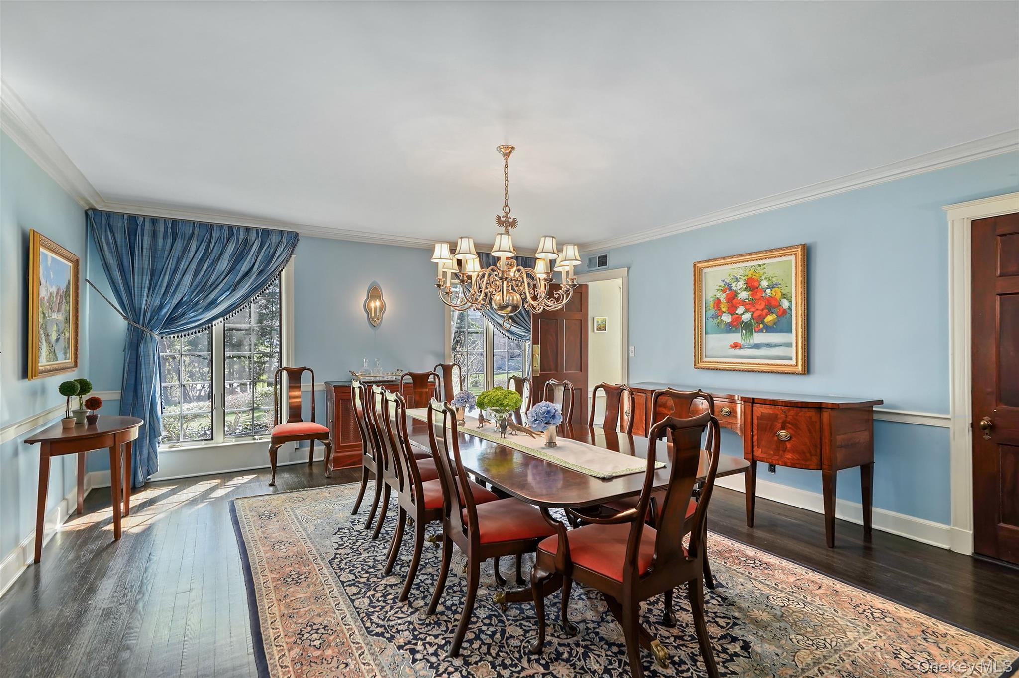 49 Moore Road Bronxville, NY 10708 - Photo 11 of 46 a view of a dining room with furniture window and wooden floor