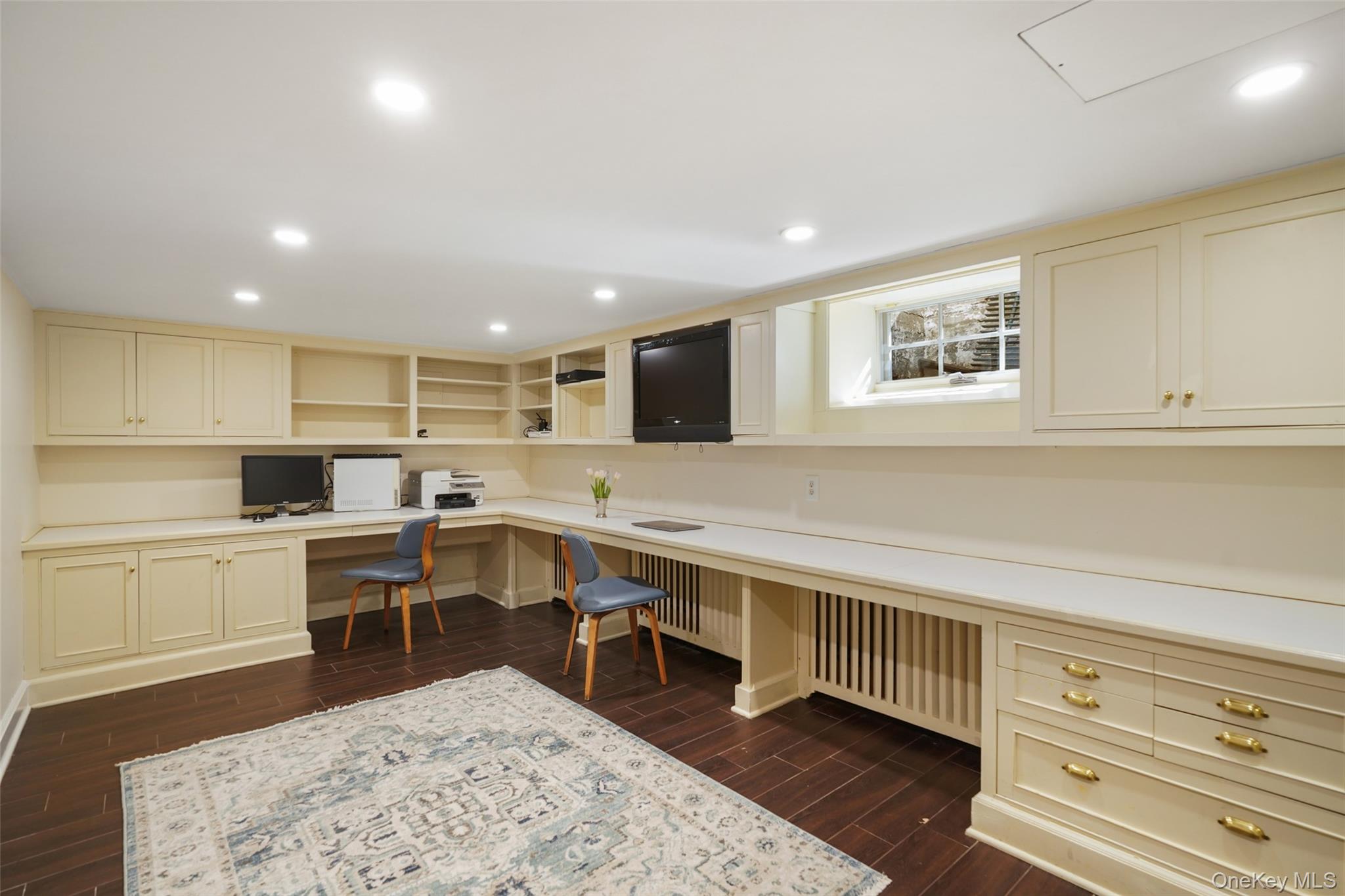 49 Moore Road Bronxville, NY 10708 - Photo 28 of 46 a large white kitchen with wooden floor