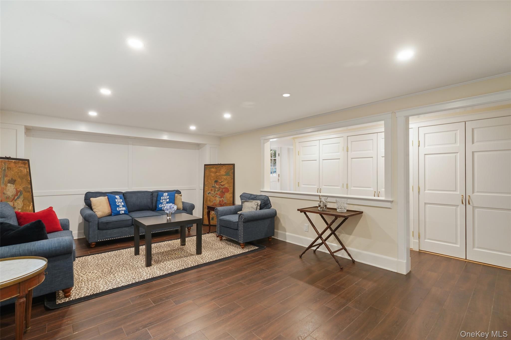 49 Moore Road Bronxville, NY 10708 - Photo 29 of 46 a living room with furniture and a wooden floor