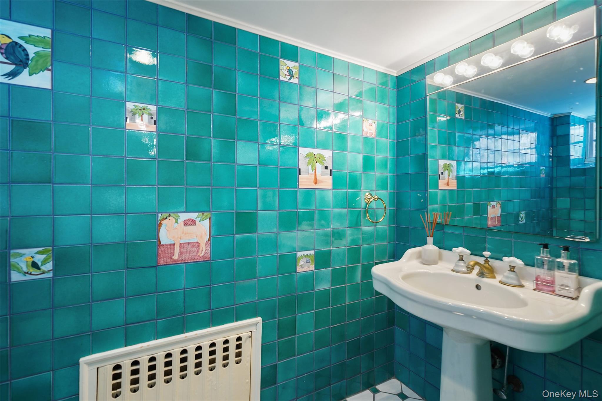 49 Moore Road Bronxville, NY 10708 - Photo 31 of 46 a bathroom with a sink a toilet and shower