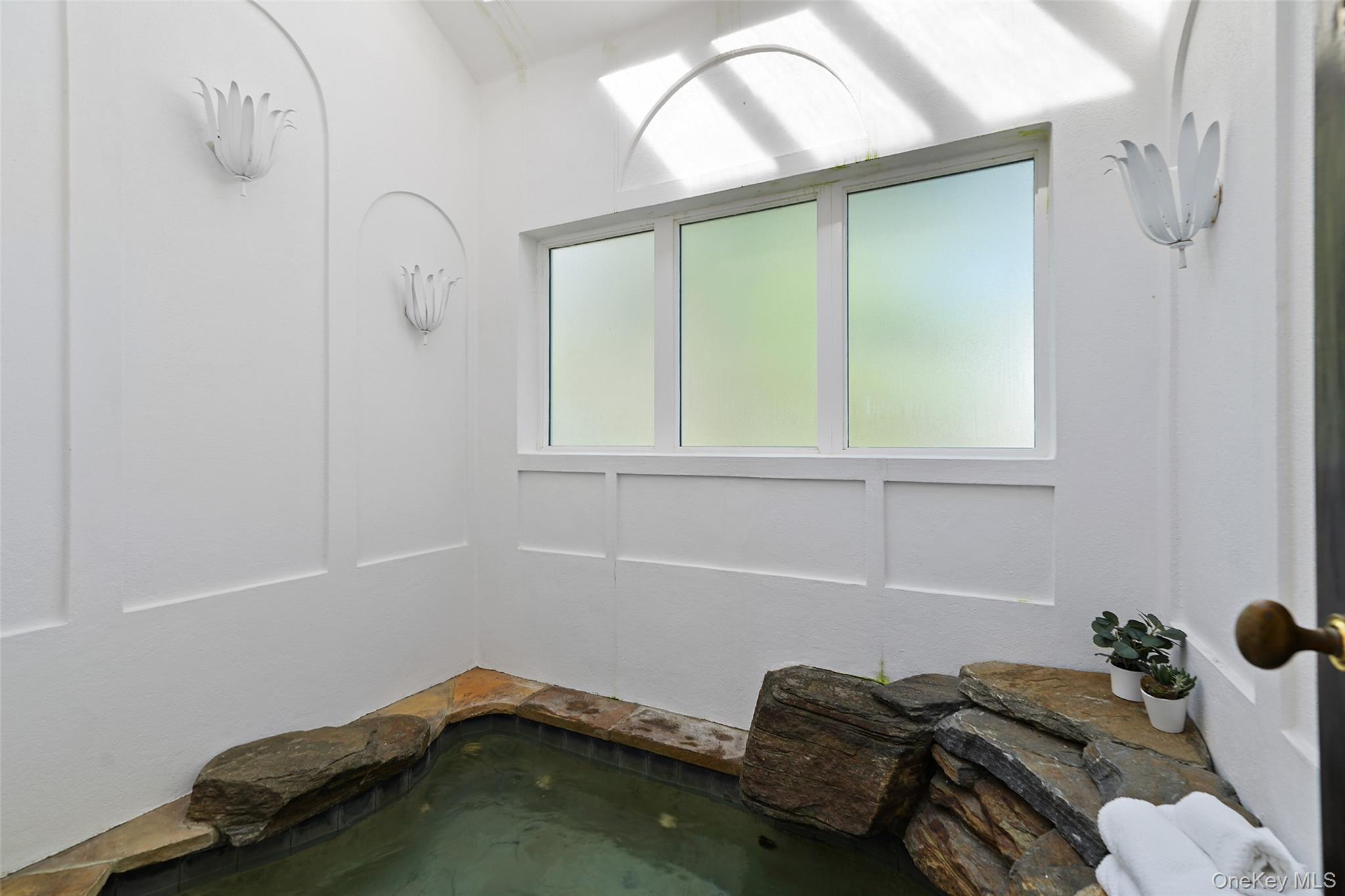 49 Moore Road Bronxville, NY 10708 - Photo 32 of 46 a room with a bed and a window