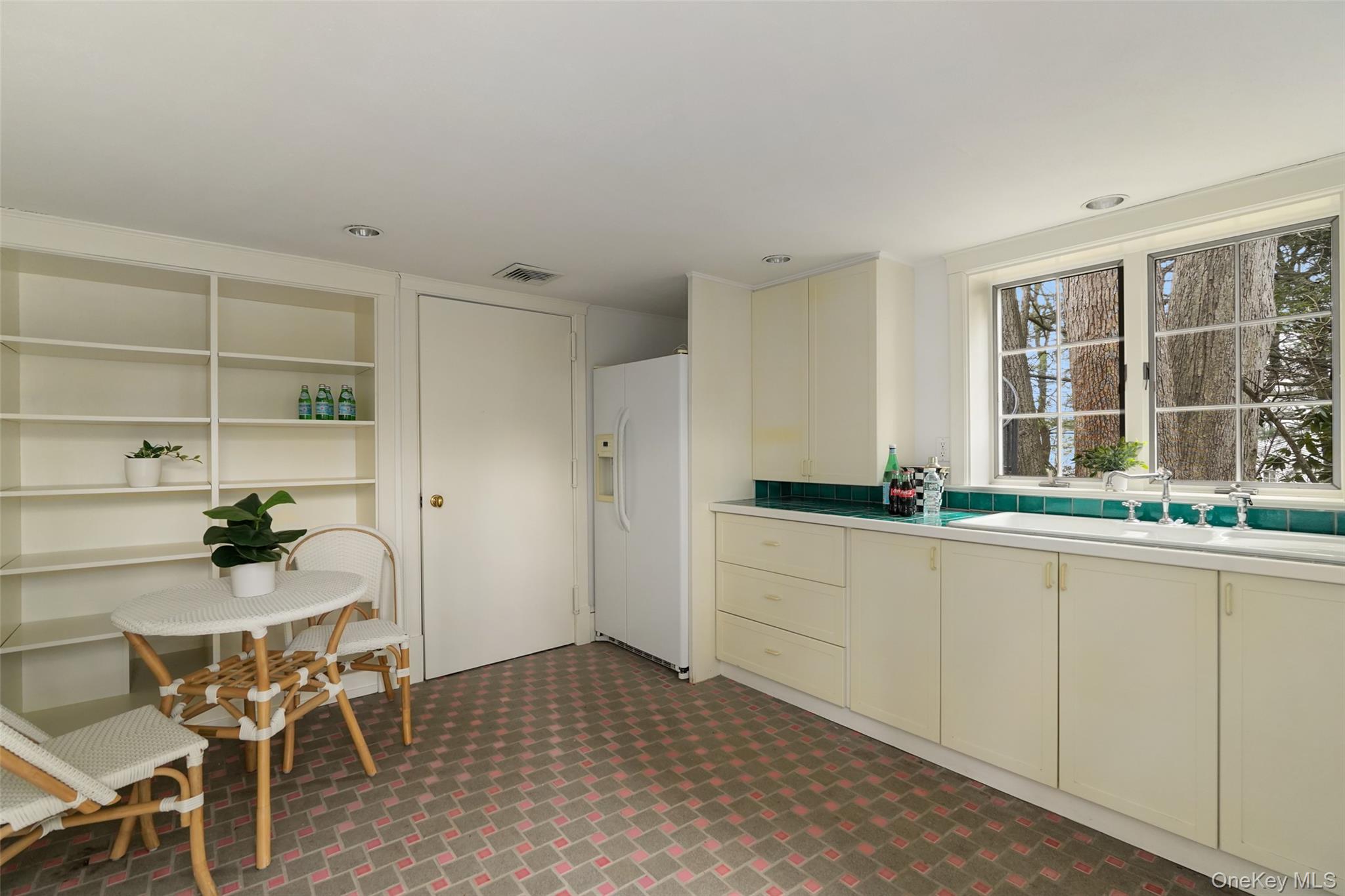49 Moore Road Bronxville, NY 10708 - Photo 33 of 46 a kitchen with a sink and cabinets