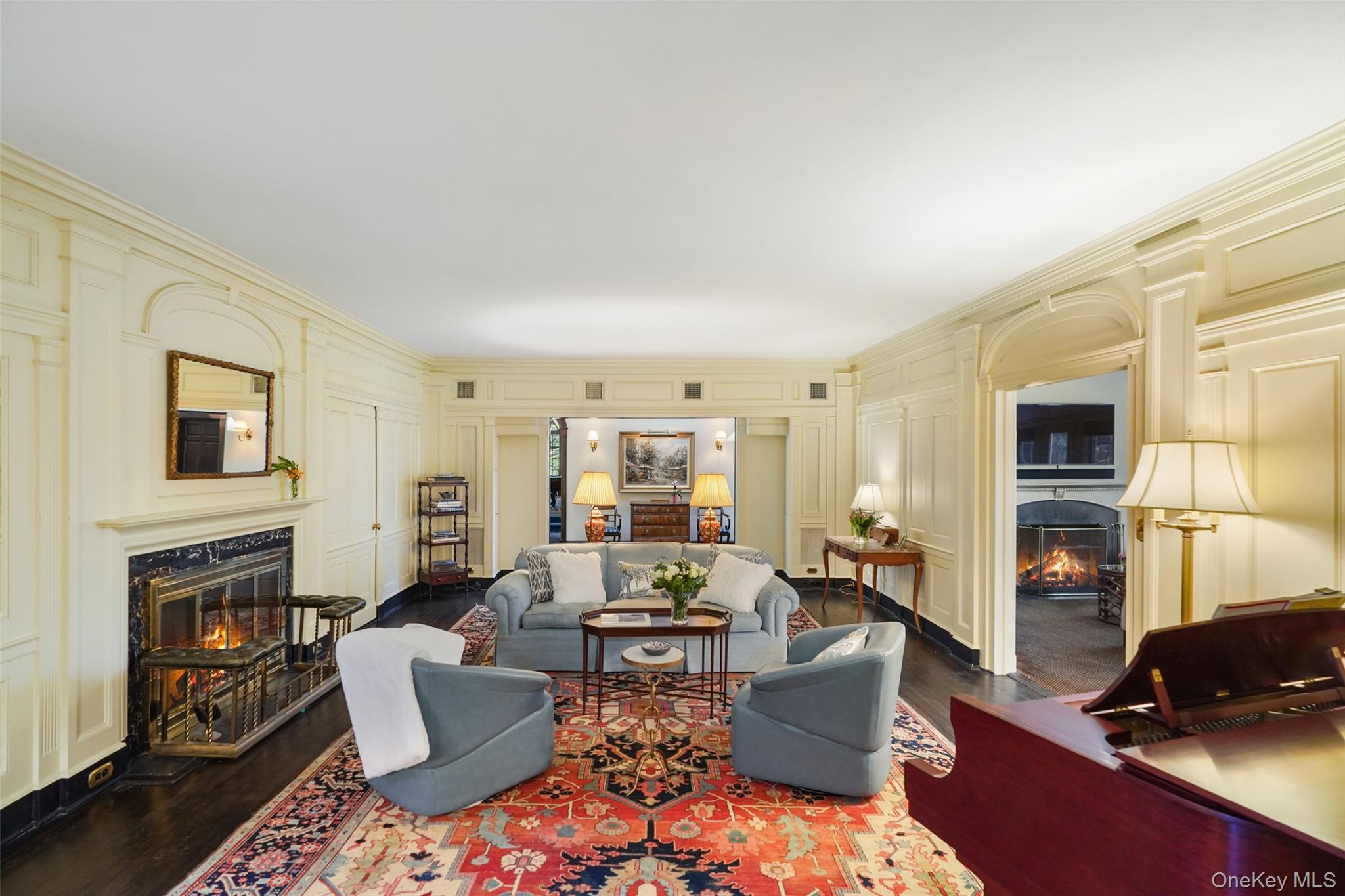 49 Moore Road Bronxville, NY 10708 - Photo 4 of 46 a living room with furniture fireplace and a flat screen tv