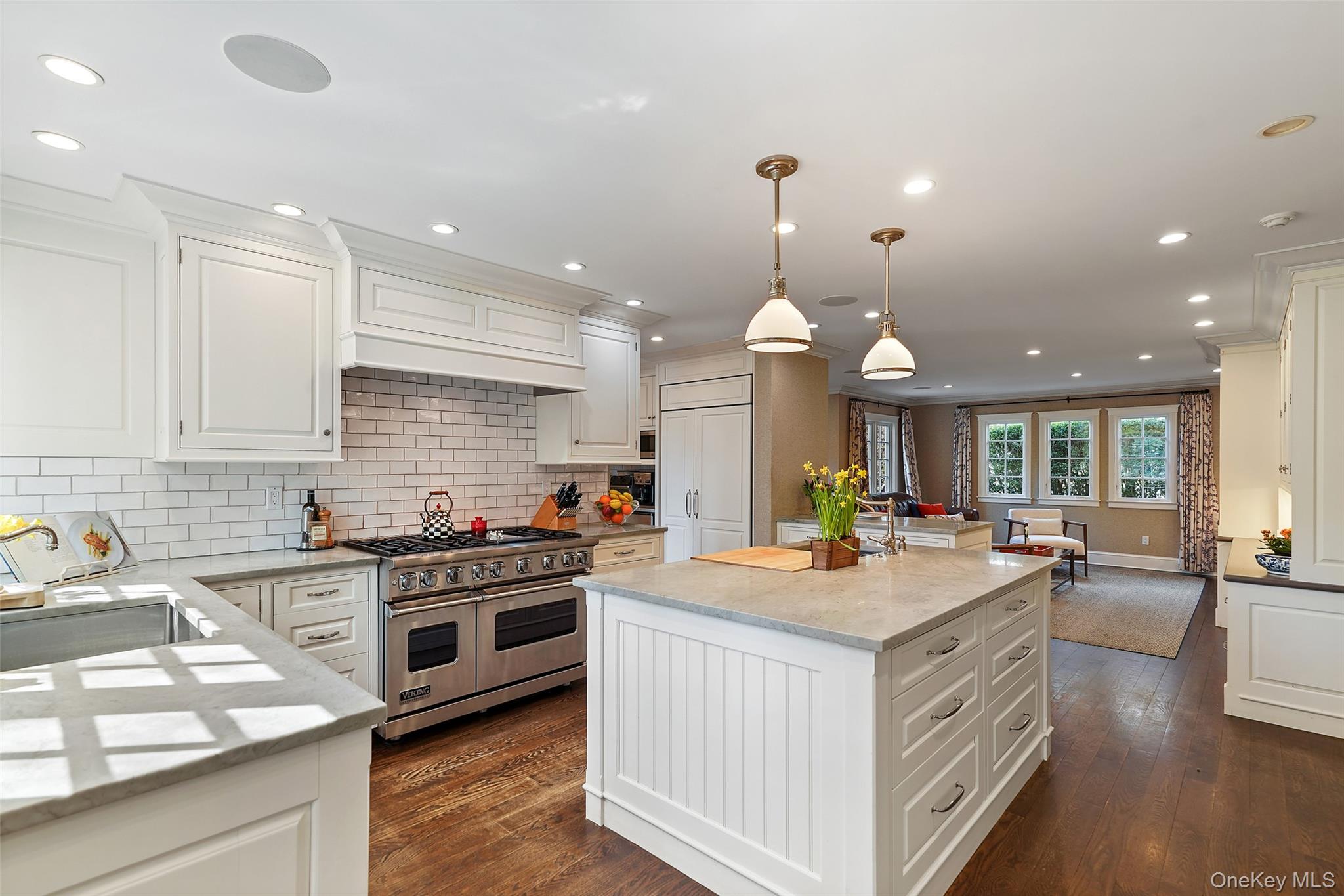 49 Moore Road Bronxville, NY 10708 - Photo 8 of 46 a kitchen with a stove and a sink