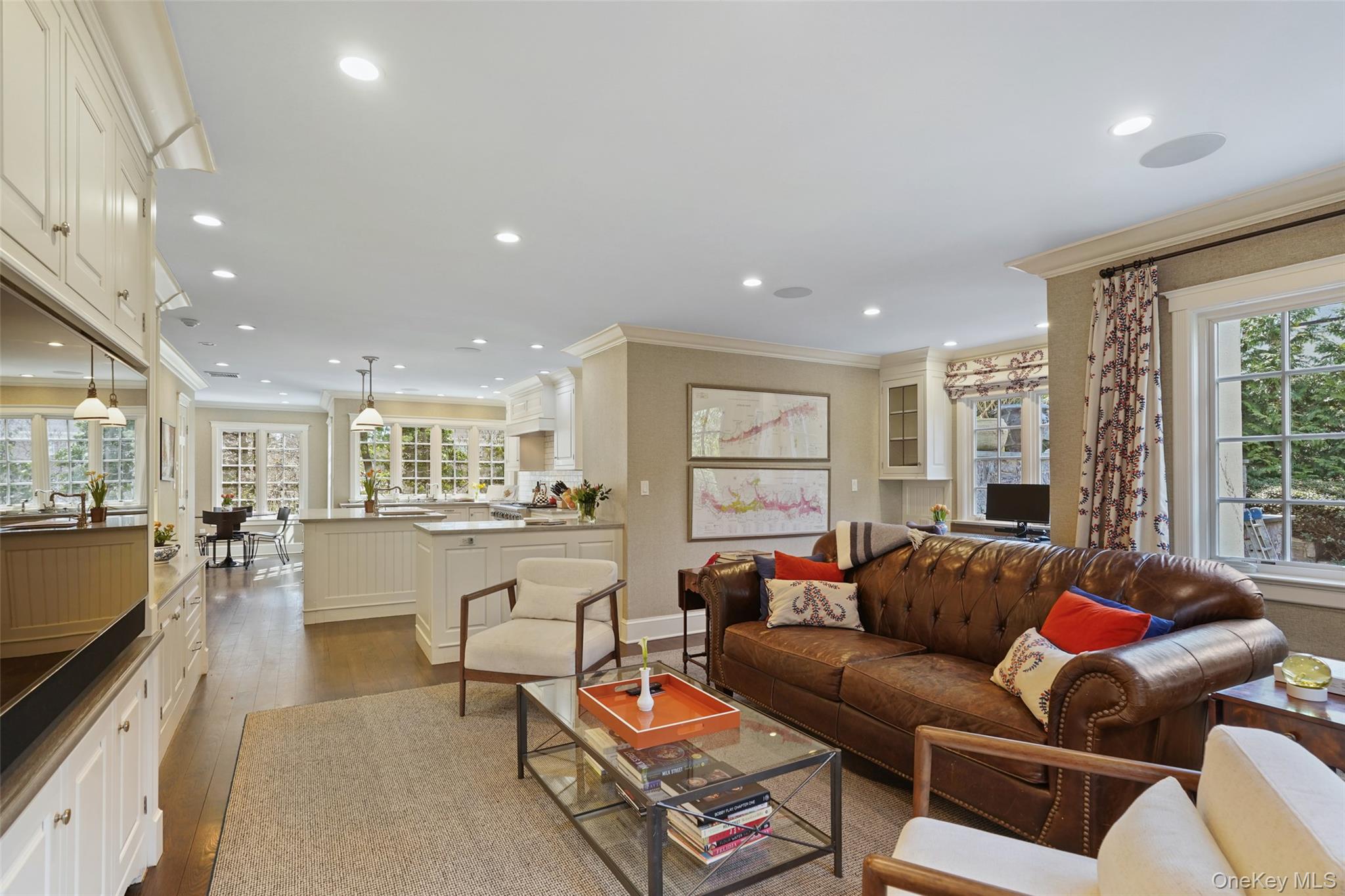 49 Moore Road Bronxville, NY 10708 - Photo 10 of 46 a living room with furniture kitchen view and a large window