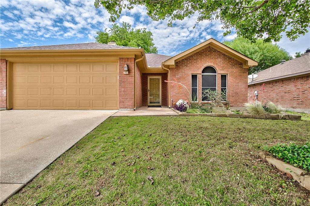 3003 Rustic Meadow Trail Mansfield, TX 76063 - Photo 1 of 1 a front view of a house with garden