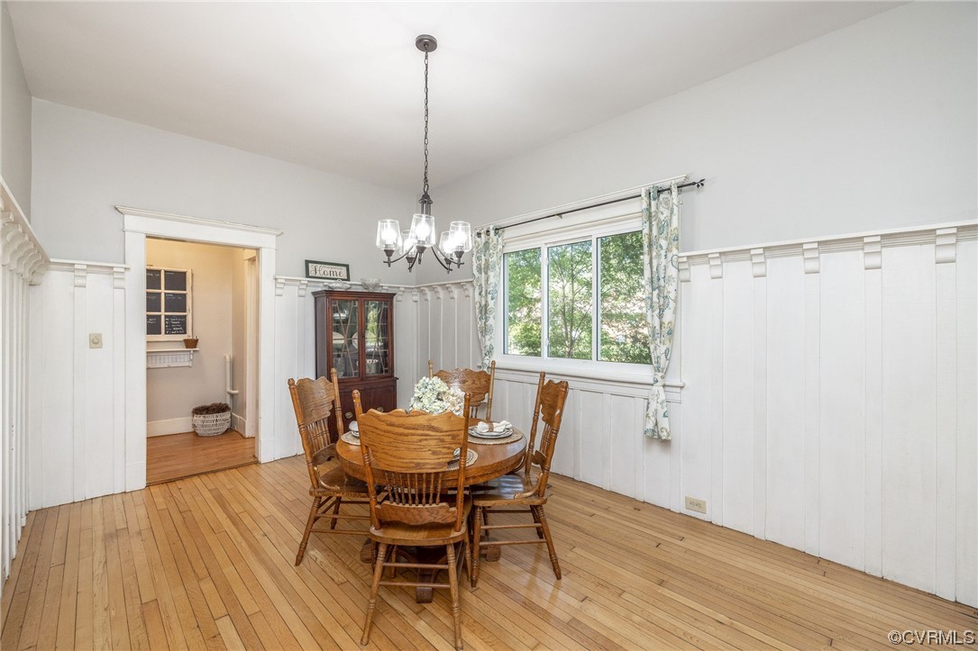 2731 Sherbourne Road Richmond, VA 23237 - Photo 13 of 45 a view of a dining room with furniture window and wooden floor