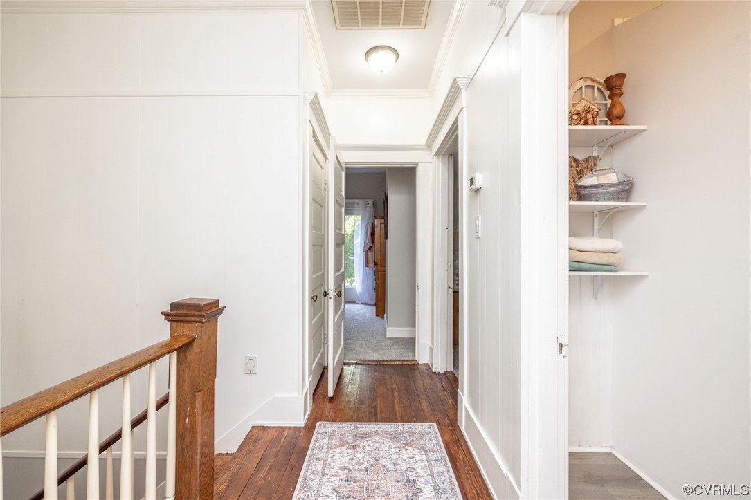 2731 Sherbourne Road Richmond, VA 23237 - Photo 24 of 45 a view of a hallway with wooden floor and staircase
