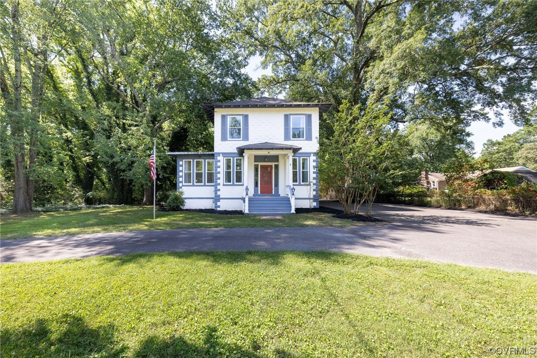 2731 Sherbourne Road Richmond, VA 23237 - Photo 3 of 45 a view of a house with backyard and a tree