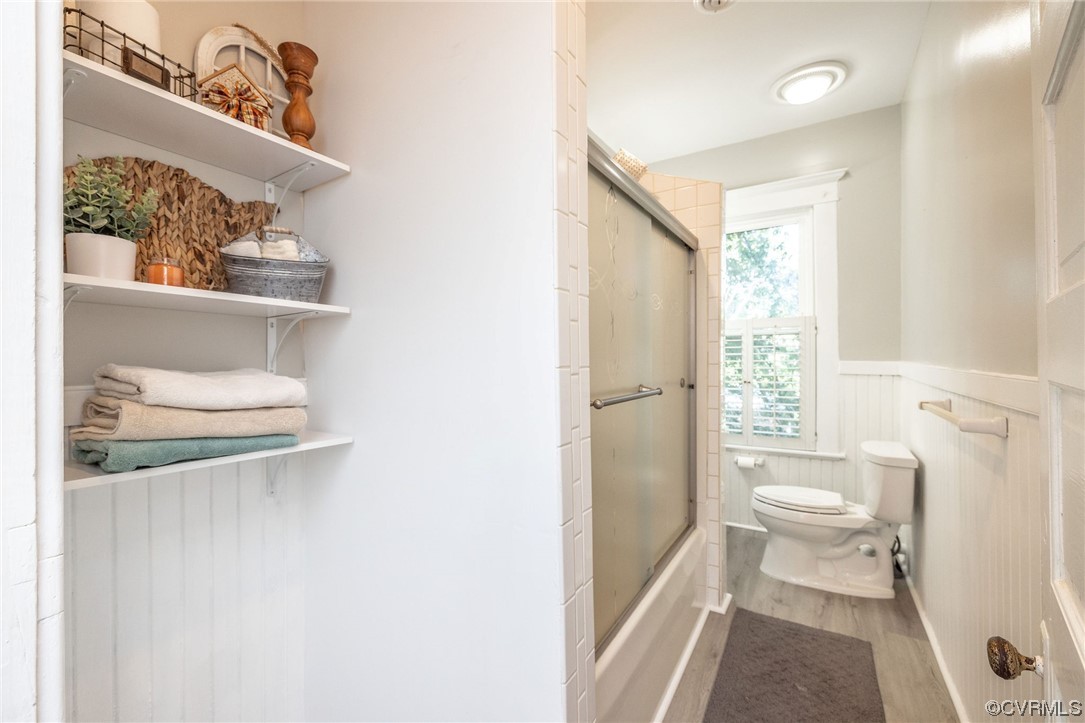 2731 Sherbourne Road Richmond, VA 23237 - Photo 31 of 45 a bathroom with a sink a toilet and shower curtain