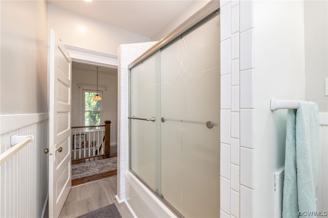 2731 Sherbourne Road Richmond, VA 23237 - Photo 33 of 45 a view of a hallway with closet and wooden floor