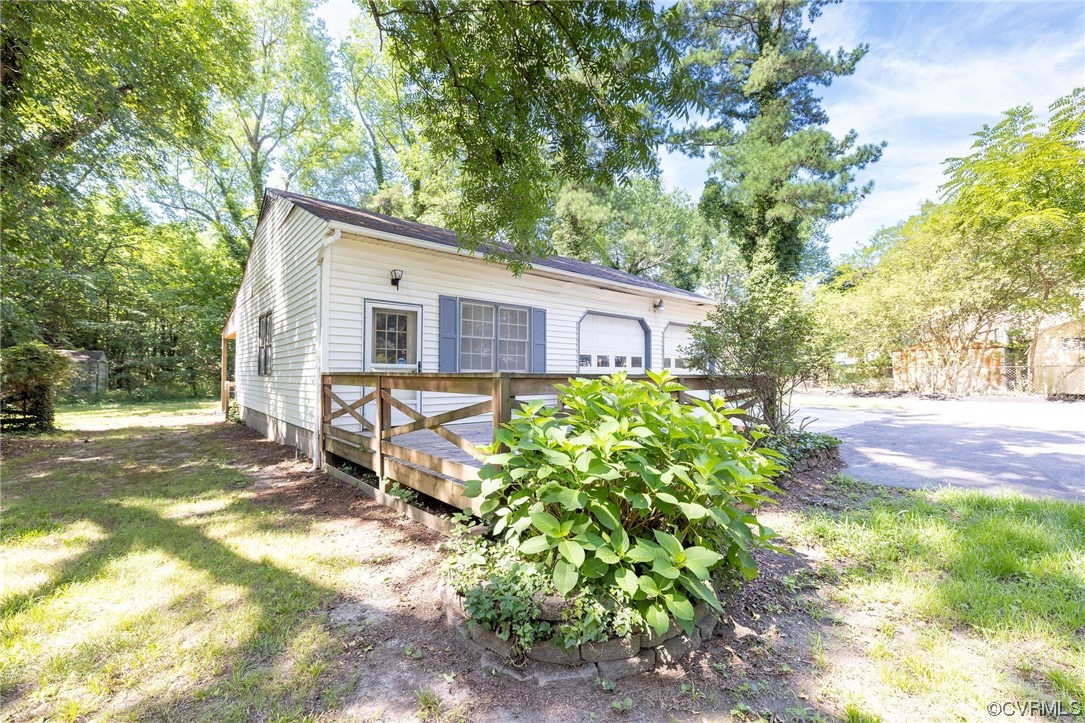 2731 Sherbourne Road Richmond, VA 23237 - Photo 45 of 45 a view of a house with a yard