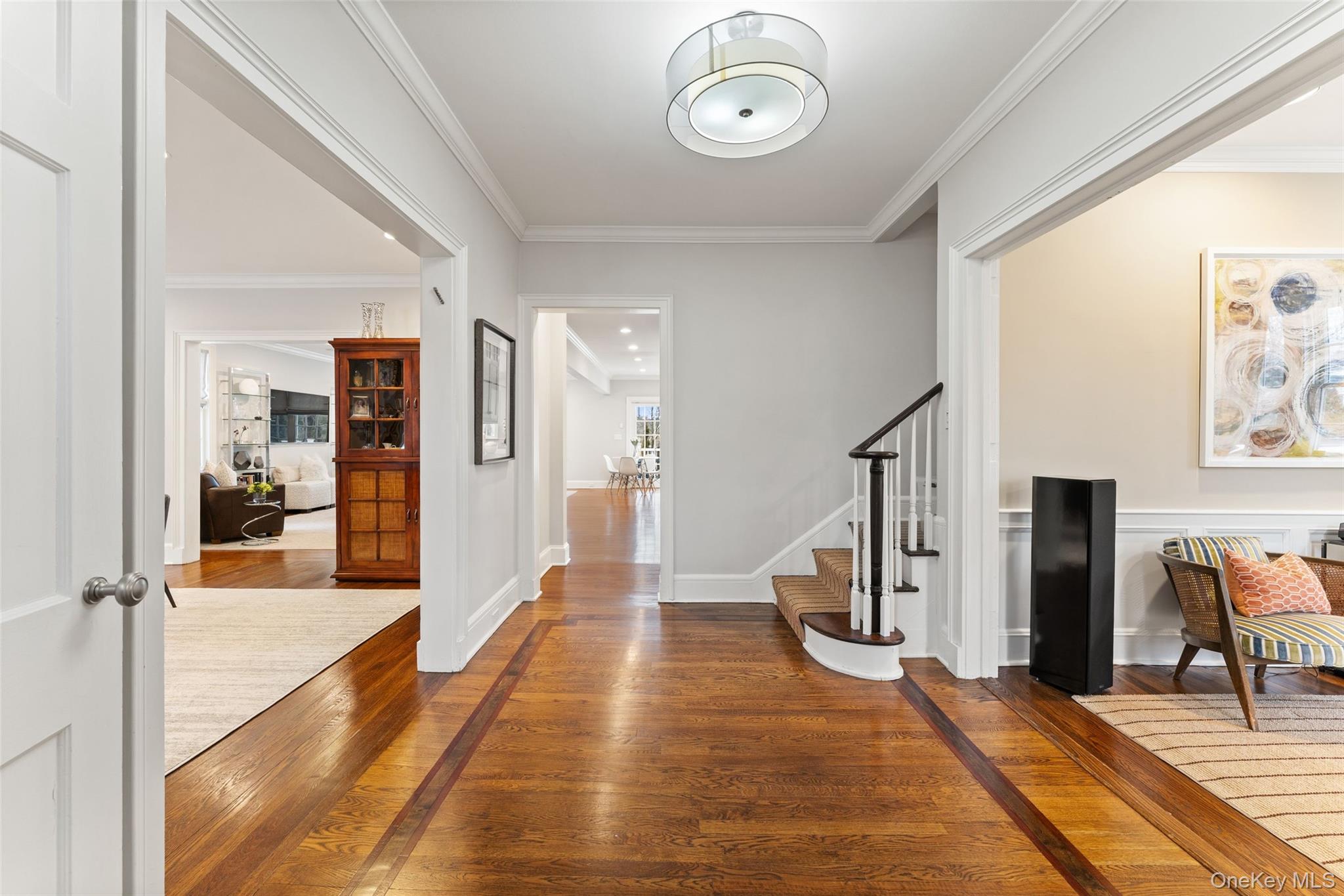 326 Heathcote Road Scarsdale, NY 10583 - Photo 2 of 40 Chic, decorative moldings and handsome millwork greet you at the door.
