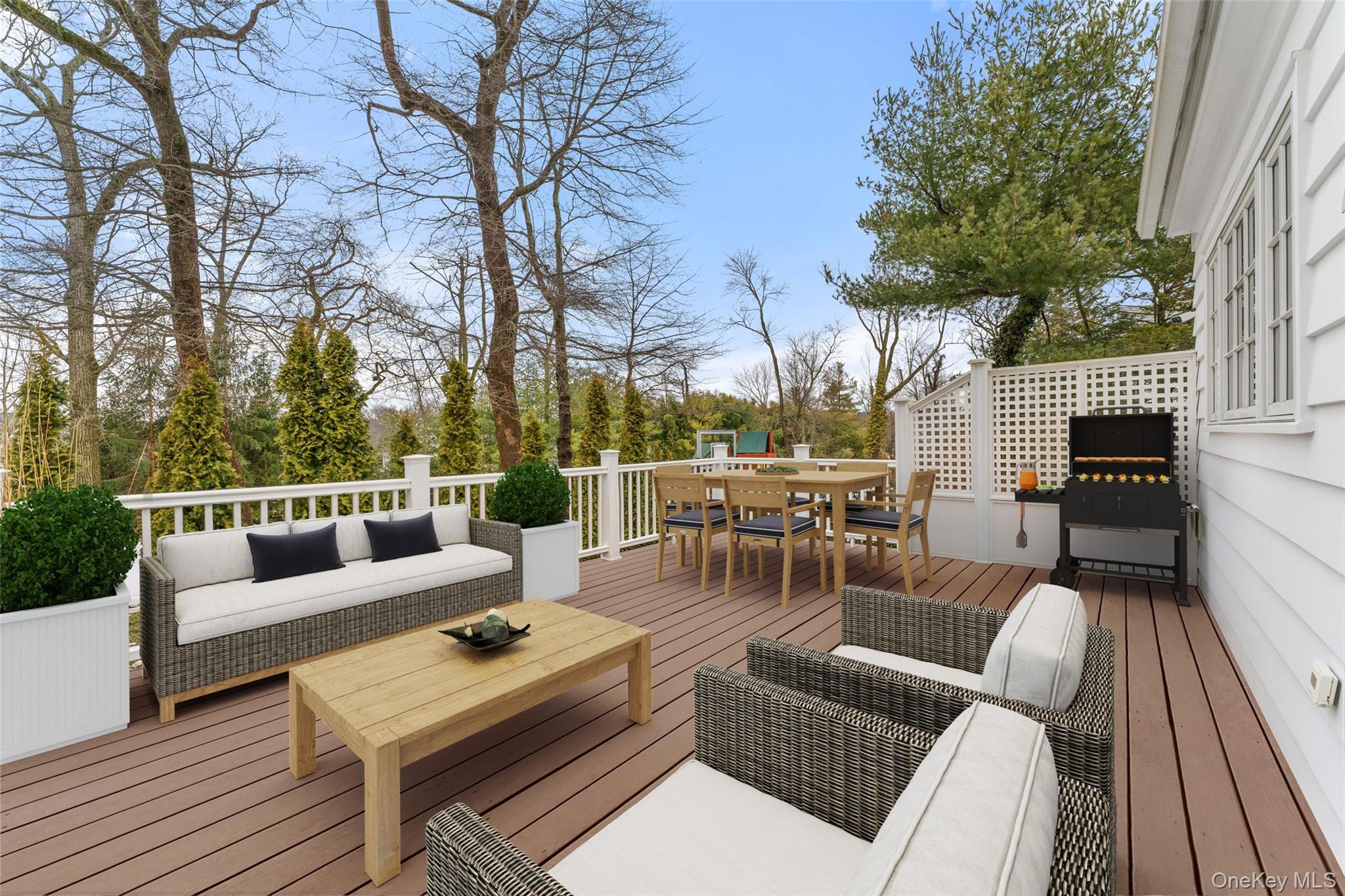 326 Heathcote Road Scarsdale, NY 10583 - Photo 31 of 40 Deck overlooking professionally landscaped grounds and private backyard