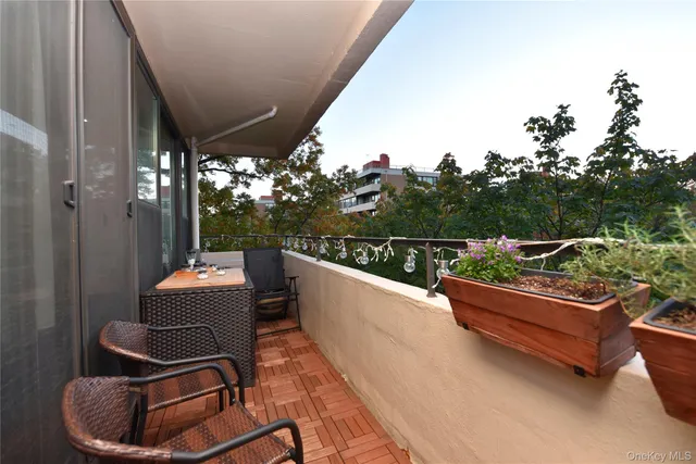 a view of a chairs in a balcony