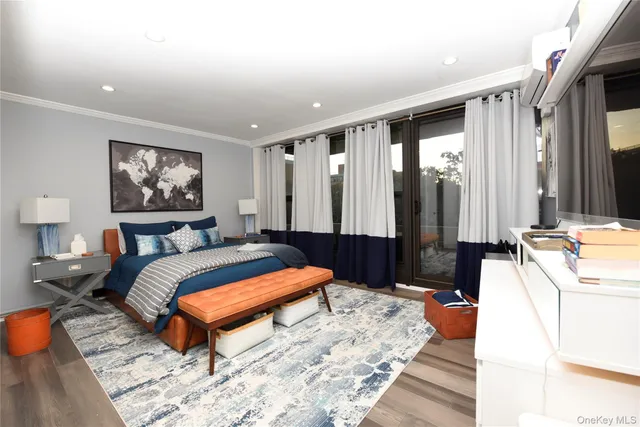 a bed room with a bed and a couch