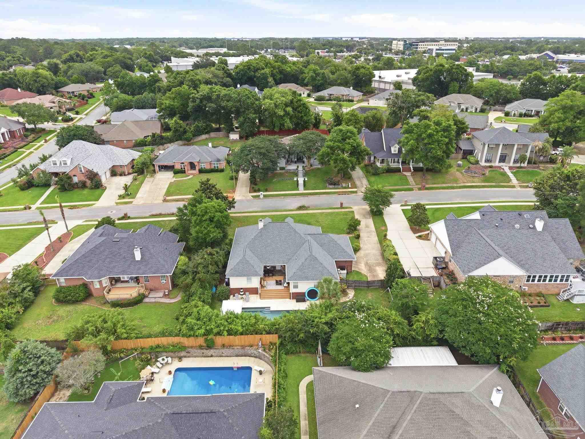 5931 Otter Point Road Pensacola, FL 32504 - Photo 55 of 67 an aerial view of a house with a garden