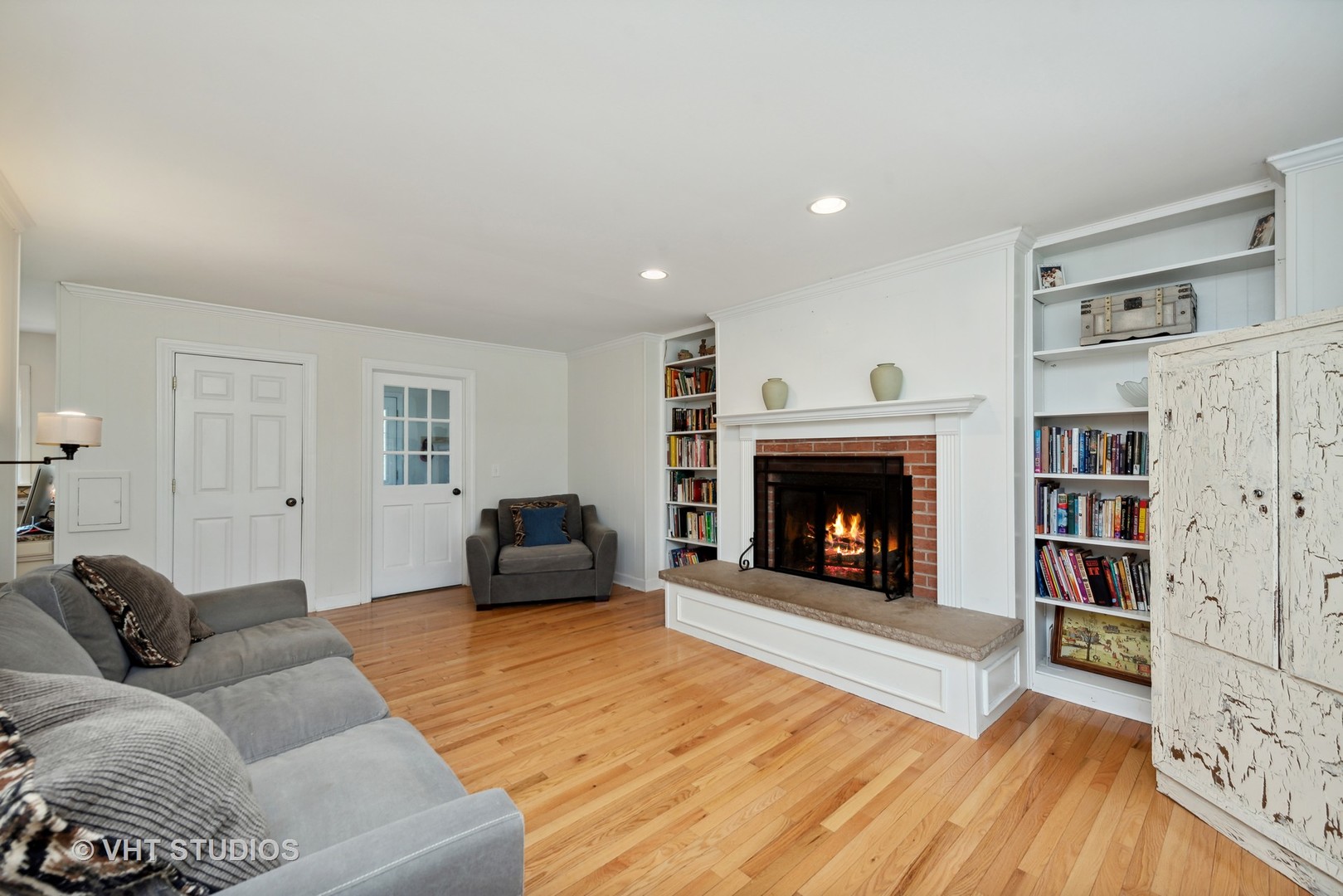 237 Valley Road Trout Valley, IL 60013 - Photo 13 of 48 a living room with furniture and a fireplace