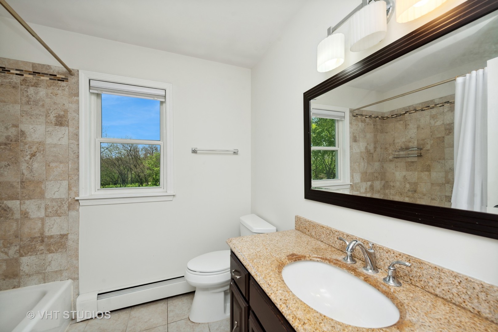 237 Valley Road Trout Valley, IL 60013 - Photo 18 of 48 a bathroom with a granite countertop sink toilet a mirror and shower