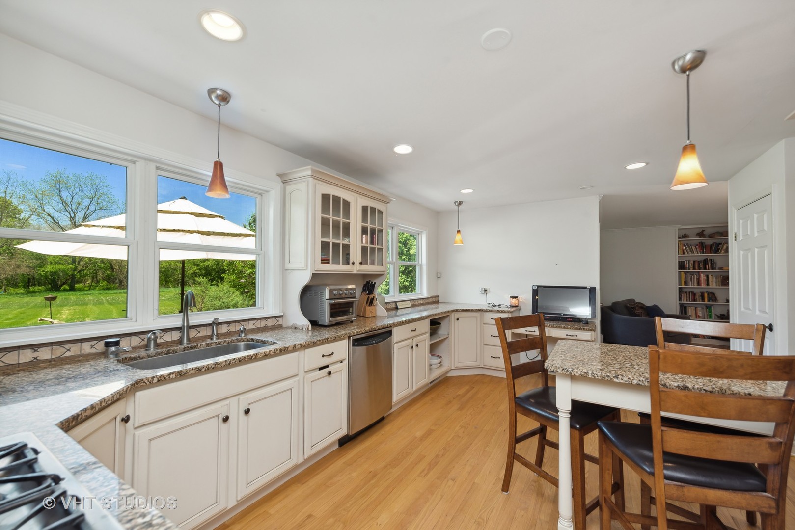 237 Valley Road Trout Valley, IL 60013 - Photo 7 of 48 a kitchen with lots of counter space dining table and chairs