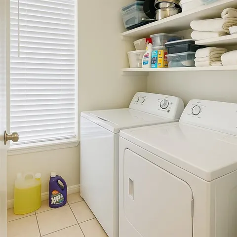 a view of a house with a backyard and a trees